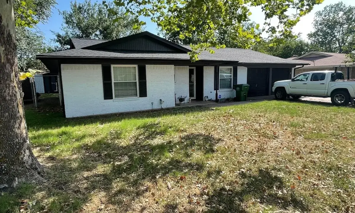 Professional roofing crew working on a residential roof in Hellertown